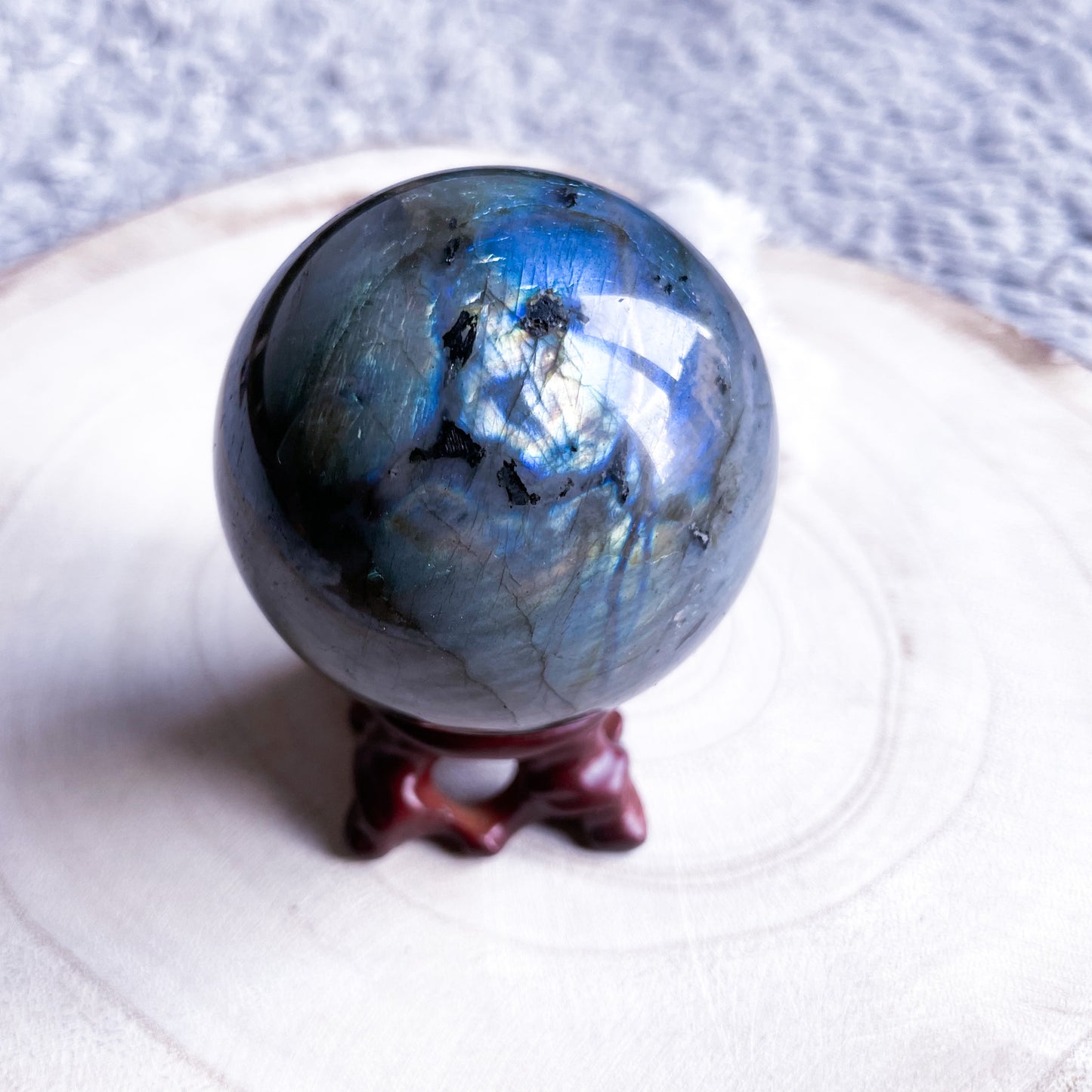 Labradorite sphere with rainbow glow