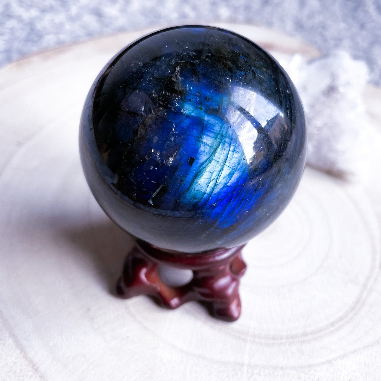 Labradorite sphere with blue glow